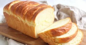 Sliced Greek yogurt yeast bread showing moist, tender crumb and perfect sandwich bread texture