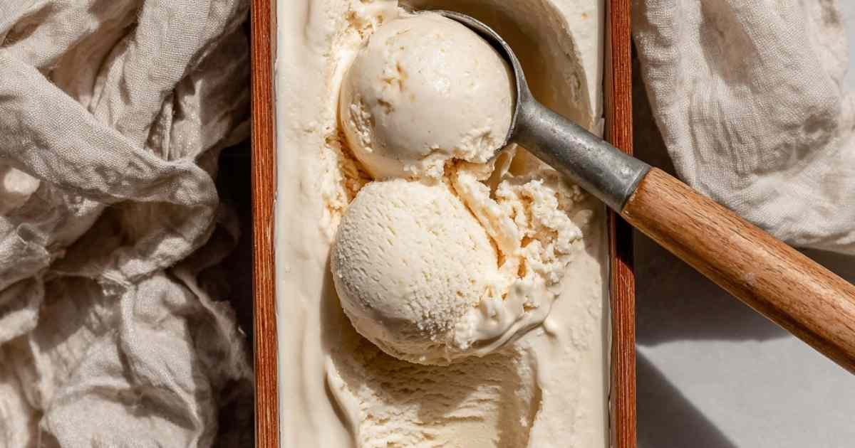 Cottage cheese ice cream scooped in bowl showing creamy texture with brown butter and vanilla