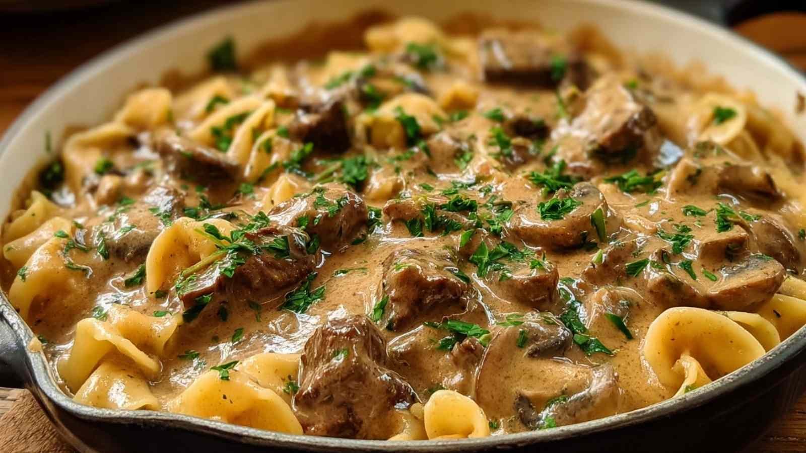 Searing beef strips for Gordon Ramsay beef stroganoff in cast iron skillet