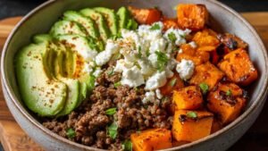 Ground beef hot honey bowl with sweet potatoes cottage cheese and avocado