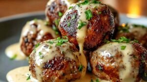 Korean BBQ meatballs mixture being formed with ground beef and Asian seasonings
