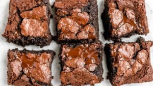 Zero sugar brownies with Greek yogurt cut into fudgy squares showing moist texture and chocolate chips