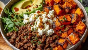 Ground Beef Hot Honey Bowl with roasted sweet potatoes and cottage cheese