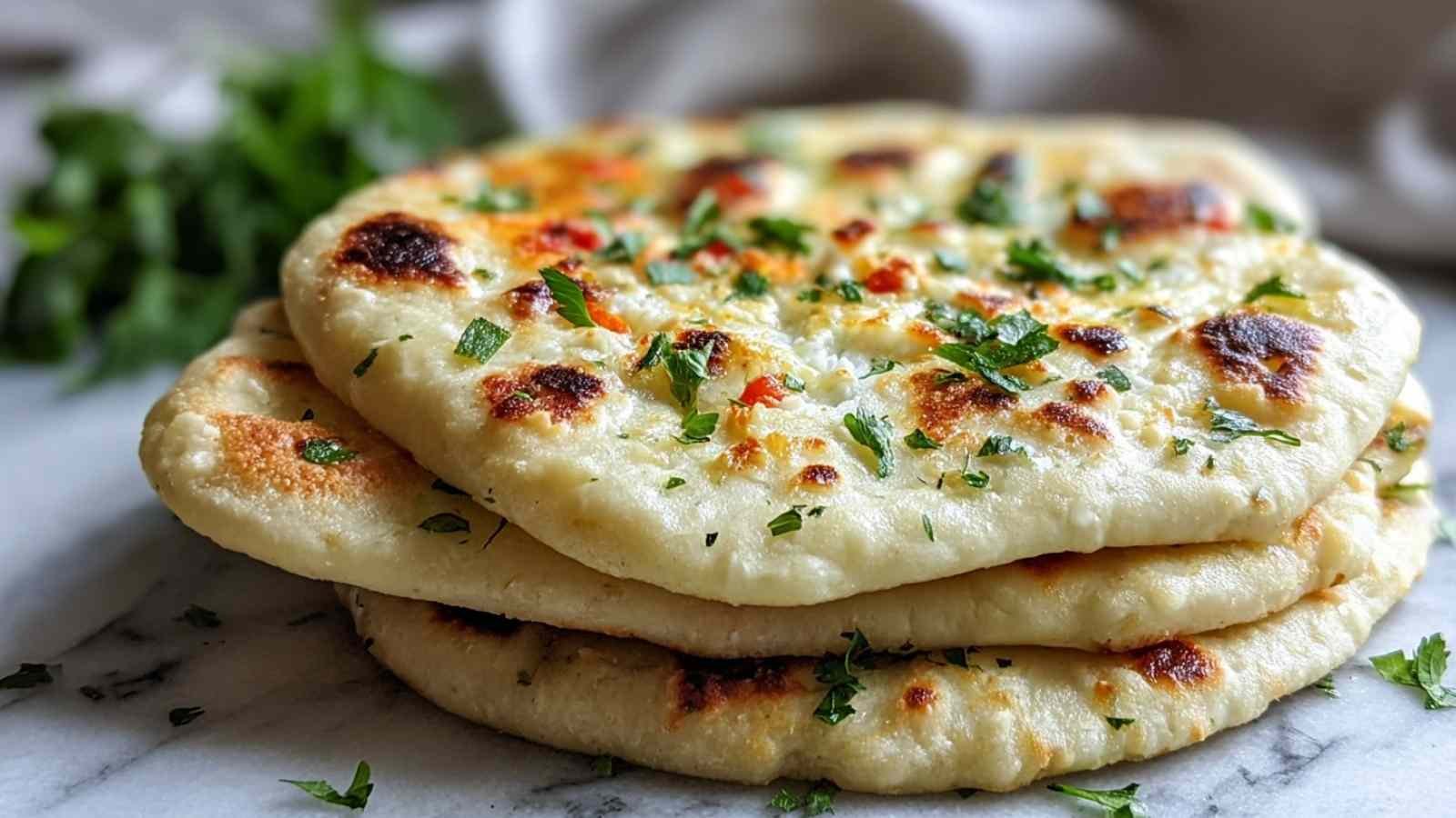 Cottage cheese flatbread ingredients including cottage cheese, eggs, and oat flour arranged on counter
